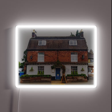 Traditional English Pub Sign with Colorful RGB Neon Illumination
