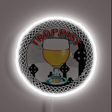 Load image into Gallery viewer, RGB illuminated LED sign featuring intricate Trappist-inspired knotwork design&quot;.