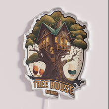 Load image into Gallery viewer, Glowing neon sign for Treehouse Brewing Company with vibrant colors