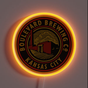 Alt text: Neon-lit round sign with 