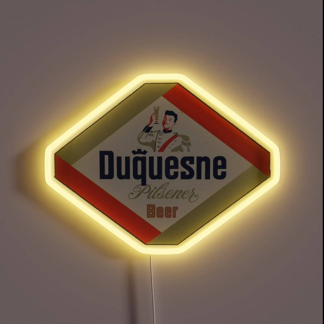 Retro illuminated vintage sign advertising Duquesne Pilsener from Pittsburgh's Duquesne Brewery.