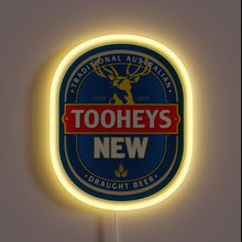 Load image into Gallery viewer, Alt text: Neon-lit oval sign featuring the &quot;Tooheys New&quot; beer logo with a stag, blue background, red and gold accents, and the words “Traditional Australian Draught Beer.”
