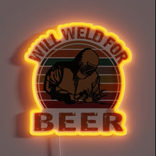 Load image into Gallery viewer, Alt text: Neon sign of a welder with the phrase "WILL WELD FOR BEER" in retro style.
