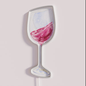 Brightly lit neon wine glass decor for modern home ambiance