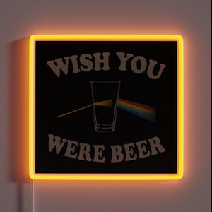 Whimsical bar decor with glowing 'Wish You Were Beer' LED.