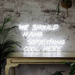 We should hang something cool here neon sign factory