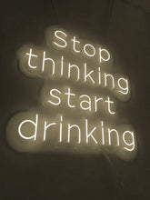 Load image into Gallery viewer, Neon that says Stop Thinking Start Drinking 