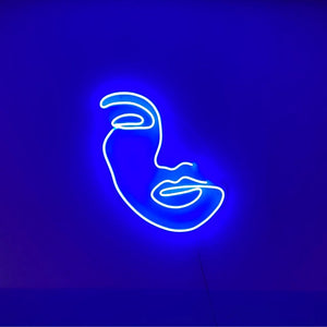 Woman face neon sign