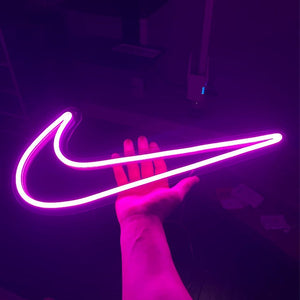 Pink Nike swoosh neon